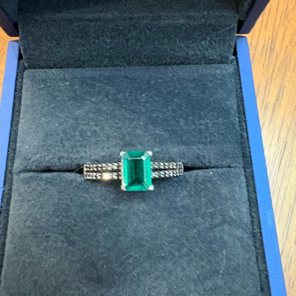 Lab created Emerald ring and 1/6 black diamonds set in sterling silver, size 8